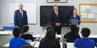 Father, daughter, son, and daughter-in-law are all working at the same school.