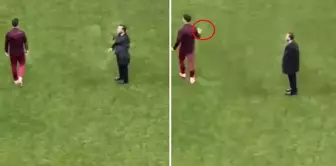 A striking moment between Günay Güvenç and Okan Buruk after the match.