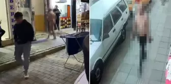 A Russian tourist walked around the street completely naked! The police quickly took him into custody.