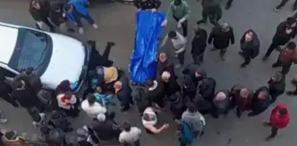 He murdered his spouse, who was in the process of divorce, by slitting her throat in the middle of the street.