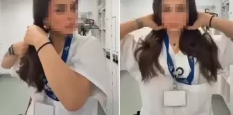 Another nurse supported the DEM Party's action! The necklace around her neck caught attention.