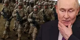 A stick under the cloak for Putin! They are sending a huge army right under his nose.