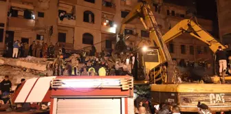 انهارت بنايتان متصلتان في آن واحد، مما أسفر عن مقتل 13 شخصًا بشكل مروع.