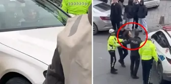 He danced at the wheel, causing a commotion while being detained.