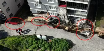 The collapsed retaining wall swallowed 7 vehicles.