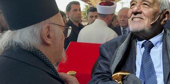 Ecumenical Patriarch Bartholomew prayed at the head of Ortaylı's coffin.
