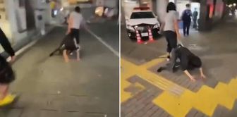 He dragged his caught spouse down the street to the police station.