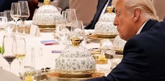 Xi got up from the table. Trump couldn't resist secretly leafing through his notebook.