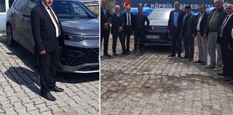 'Official vehicle' pose in front of the municipal building