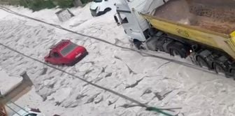 Heavy rain and hail hit the capital, bringing life to a standstill.