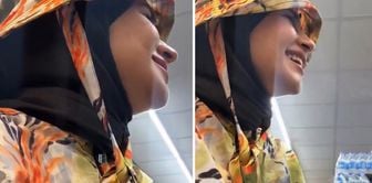 The man who verbally harassed a veiled woman has been taken into custody.