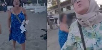 The woman who attacked the headscarved mother and her daughter sitting on the beach is now really in trouble.