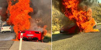 A luxury car that caught fire while in motion was reduced to ashes.
