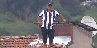 A Sarıyerspor fan watched the Muğlaspor match from the roof.
