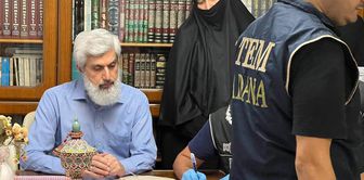The moments when Alparslan Kuytul and his wife were detained.