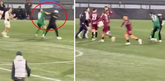 The place turned into a war zone! The goalkeeper punched a fan who ran onto the pitch.
