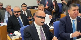 After the appointment of a trustee to Halk TV, New Party MPs taped their mouths and eyes.