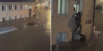 He was caught in the middle of the floodwaters in Sarıyer and saved his life by climbing onto a glass window.