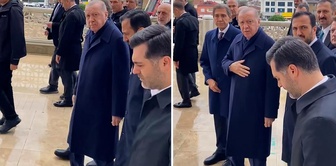 When he saw President Erdoğan, he couldn't hold back; the bodyguards immediately intervened: We're in a mosque, don't shout.