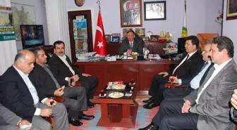 Ak Partili Yöneticiler Başkan Ertegün Ünal'ı Makamında Ziyaret Etti