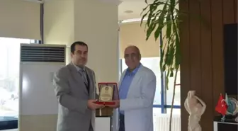 Başkan Koç'a Plaket