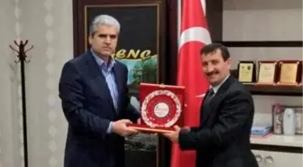 Bingiad'dan Genç Belediye Başkanı Ariç'e Plaket