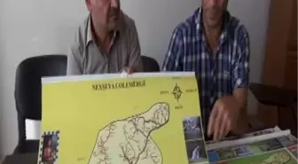 Kurdi-Der'in Haritasını Çalıp Üzerine Reklam Yapıştırdı