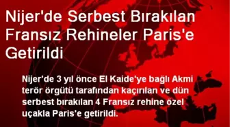 Nijer'de Serbest Bırakılan Fransız Rehineler Paris'e Getirildi