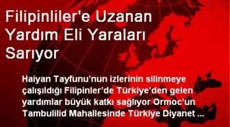 Filipinliler'e Uzanan Yardım Eli Yaraları Sarıyor