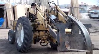 Hurda traktörü 'iş makinesi' yaptı -