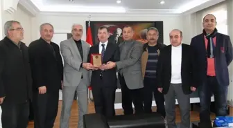 İşadamlarından Kaymakam Daştan'a Plaket