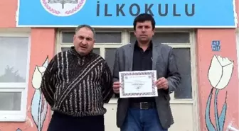 Altınkent Ortaokulu'na Nafi Güral Fen Lisesi'nden Kutlama Belgesi