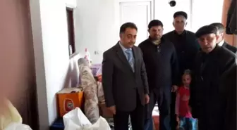 Arpaçay Tepecik Köyü'nde Evi Yanan Aileye Yardım