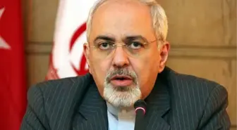 İran Dışişleri Bakanı Zarif, İmam Rıza'nın Türbesinde 'Hadim' Oldu