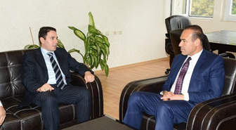 Başkan Sözlü, Kozan Kaymakamı Oral'ı Ziyaret Etti