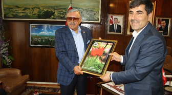 Eski Vekilden Başkan Asya'ya Ziyaret