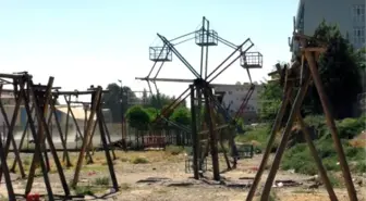 Children Of Curfew-struck Cizre And Hollow Wooden Swings