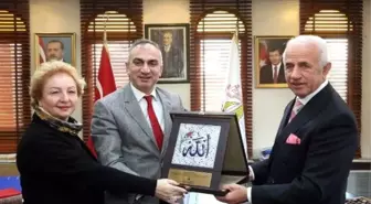 Başkan Yılmazer İşadamı Nafi Güral'a Plaket ve Berat Takdim Etti