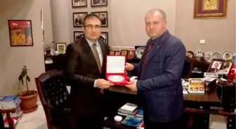 Ankara Eko Avrasya Derneği'nden Gülbey'e Plaket