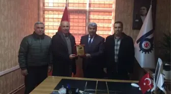 Eryılmaz'a Plaket