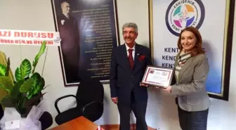 Esküder'den Eskişehir Kent Konseyi Başkanı Nuray Akçasoy'a Teşekkür Belgesi