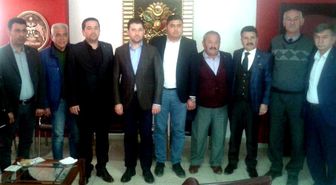 AK Parti Mezitli Yönetiminden MHP Mezitli'ye Ziyaret