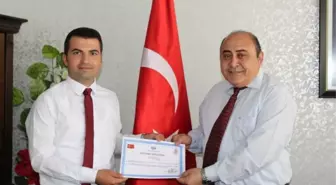 Kaymakam Karakurt'tan Müdür Çalık'a Başarı Belgesi