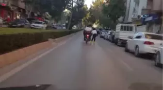 Patenle Motosiklete Tutundu, Hem Kendi Canını Tehlikeye Attı, Hem de Başka Sürücüleri