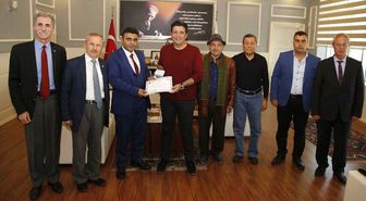 Başkan Genç'e Teşekkür Belgesi