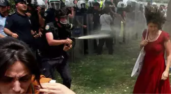 Gezi Parkı'nda 'Kırmızılı Kadının' Yüzüne Biber Gazı Sıktıran Ramazan Emekli Hakkında Yakalama Kararı Çıkarıldı