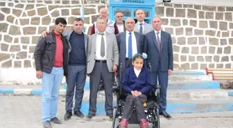 Bulanık'ta Engelli Öğrenciye Tekerlekli Sandalye Desteği