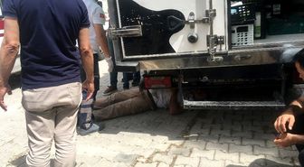 Hareket eden kamyonetin altında kalan sürücü yaralandı