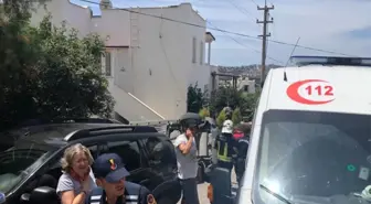 Aracını park etmek isterken başka aracın üstüne düştü