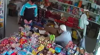 Alışveriş bahanesiyle markete giren şahıs masadaki telefonu böyle çaldı